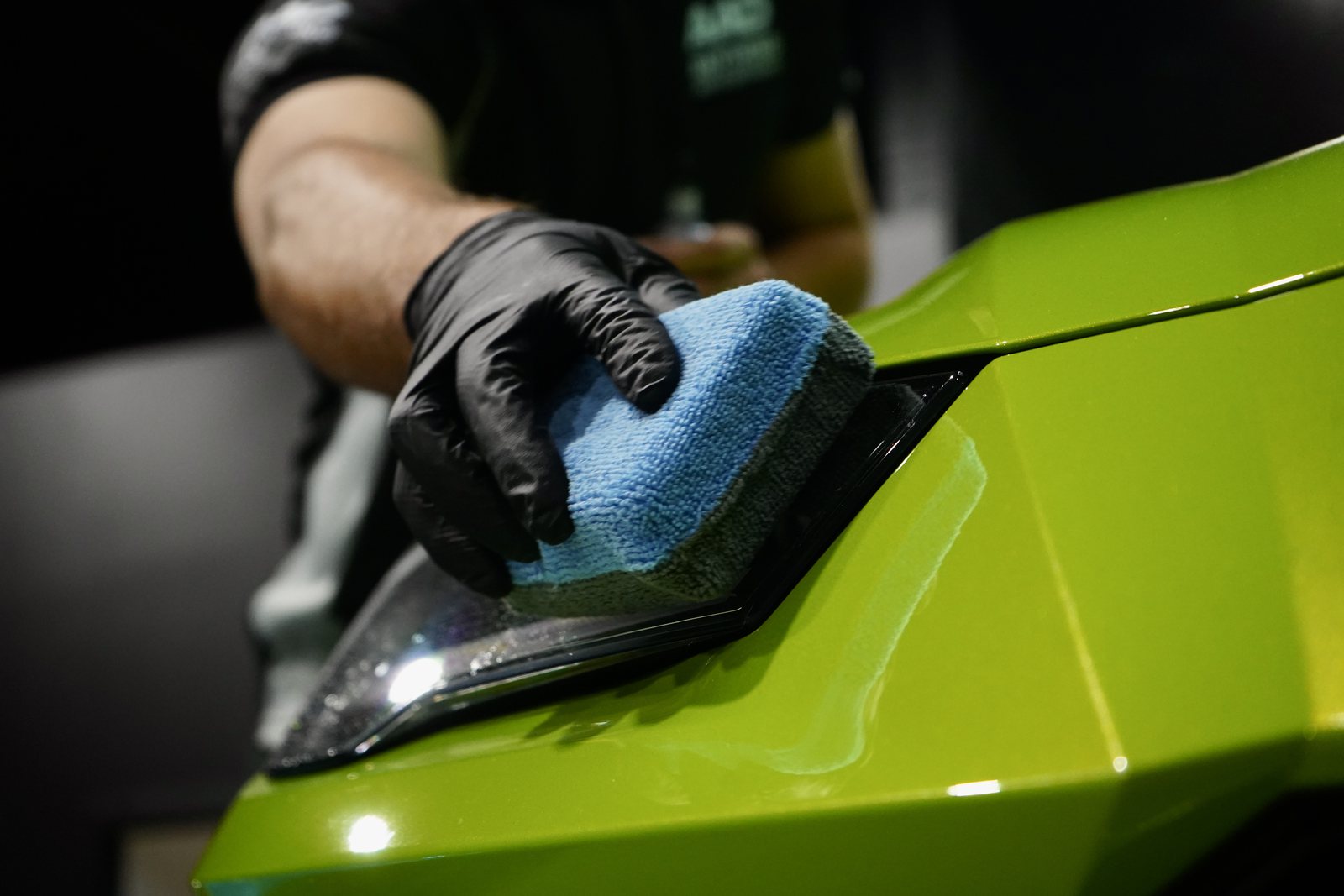 Ceramic coating being applied by hand to a Lamborghini Huracan