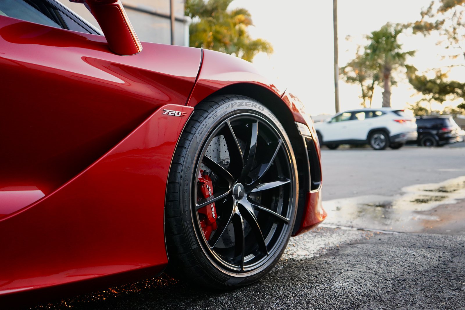 Red McLaren 720S detailed to a mirror finish at golden hour